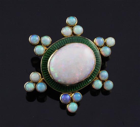 A late Victorian gold, white opal and green enamel brooch, 1.25in.